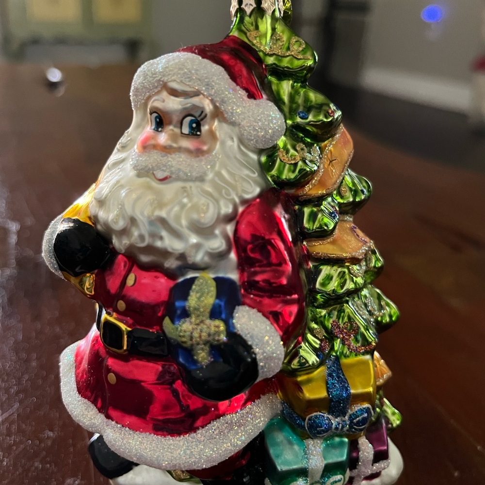 Festive Santa Claus Ornament with Gifts
